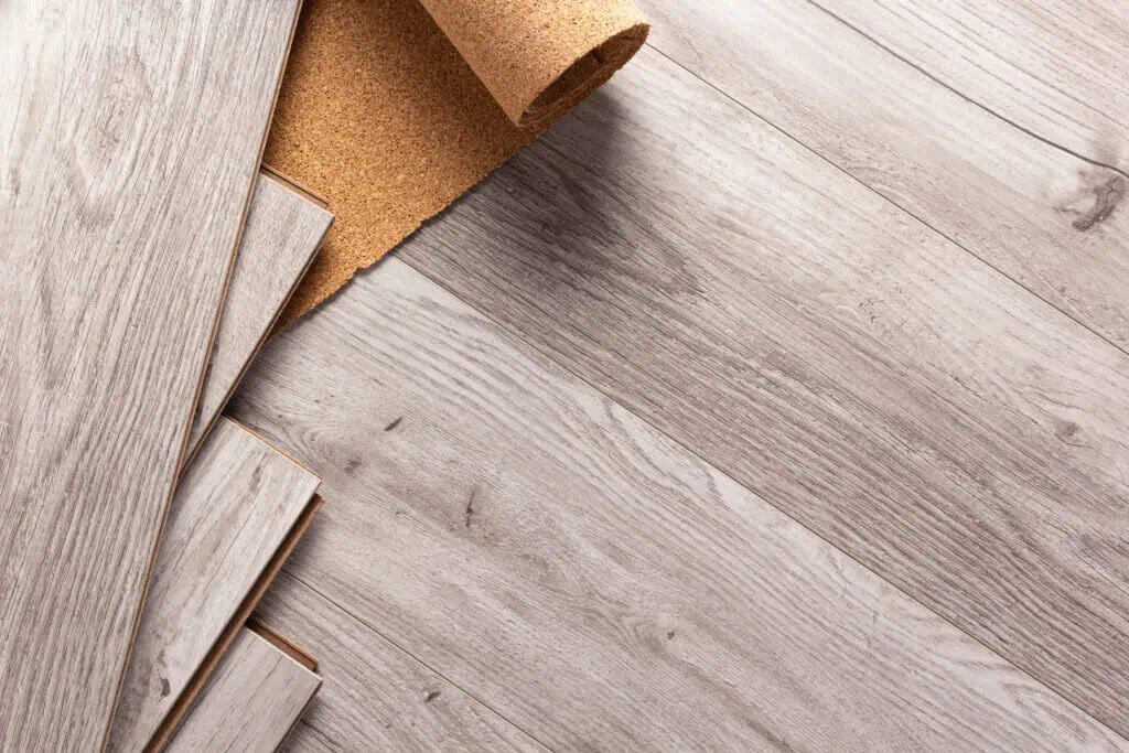 Sample wood flooring and laminate flooring materials for home renovation projects.